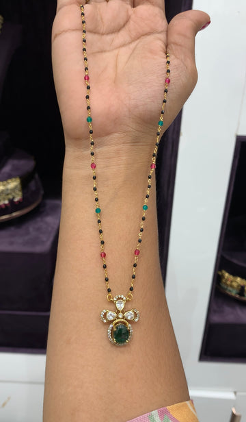 Cute Green uncut stone locket with Black beads