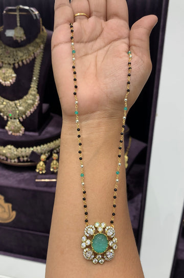 Beautiful locket with hand made Black beads