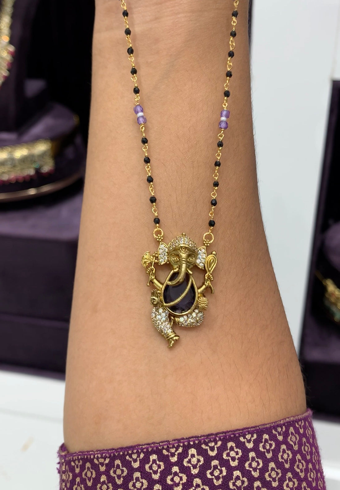 Beautiful Purple Stone Vinayaka locket with black beads