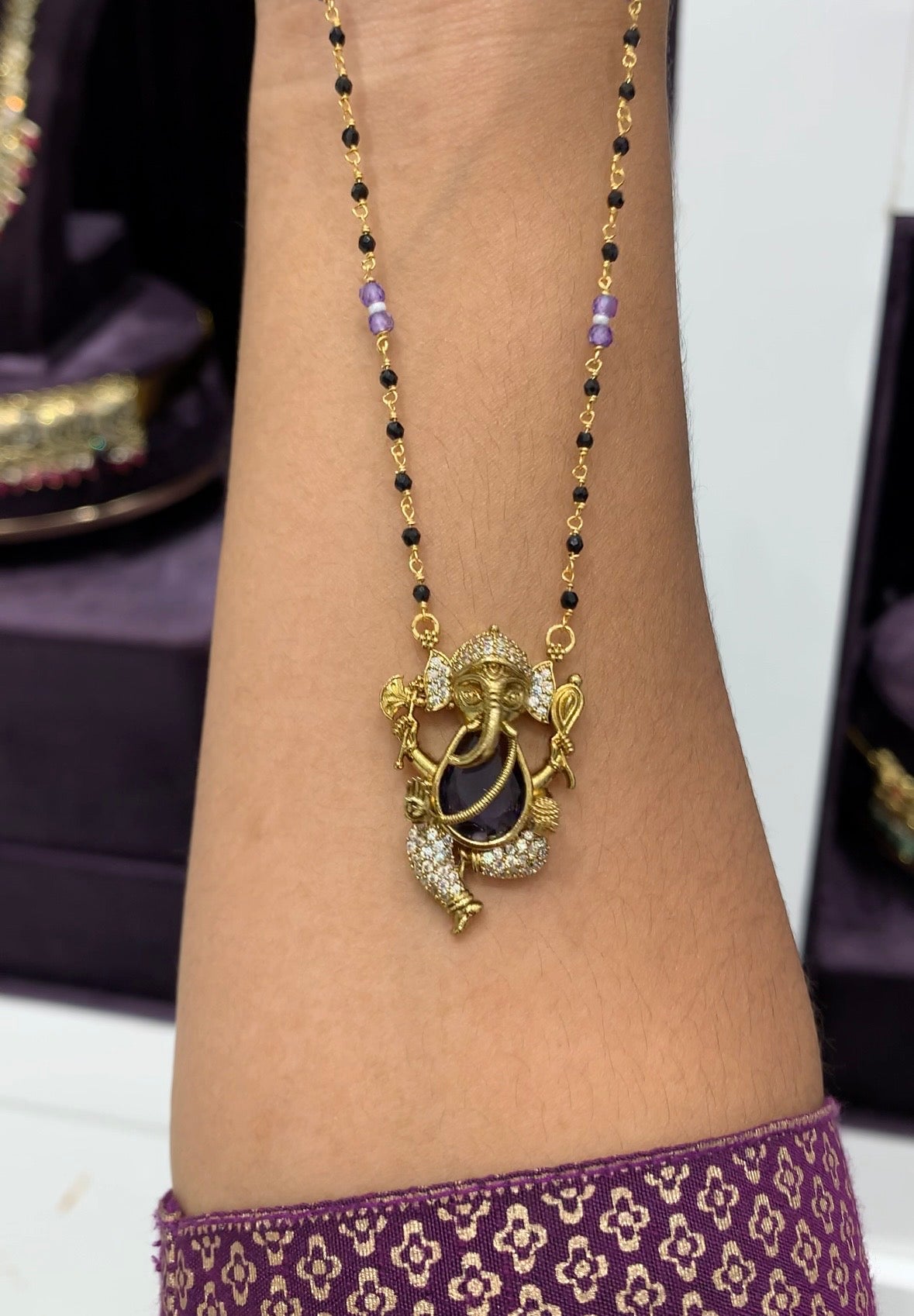 Beautiful Purple Stone Vinayaka locket with black beads