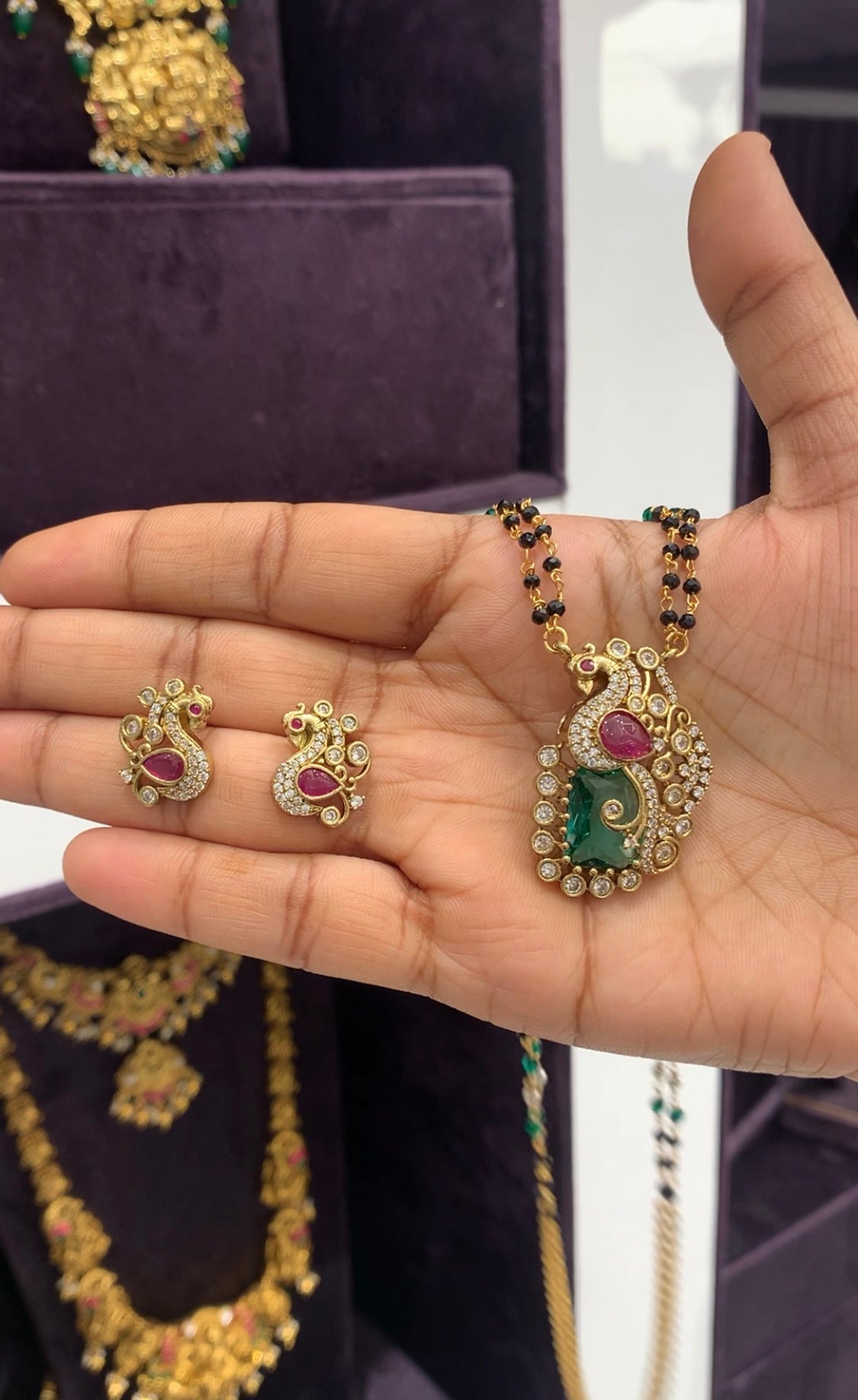 Beautiful Peacock locket set with black beads