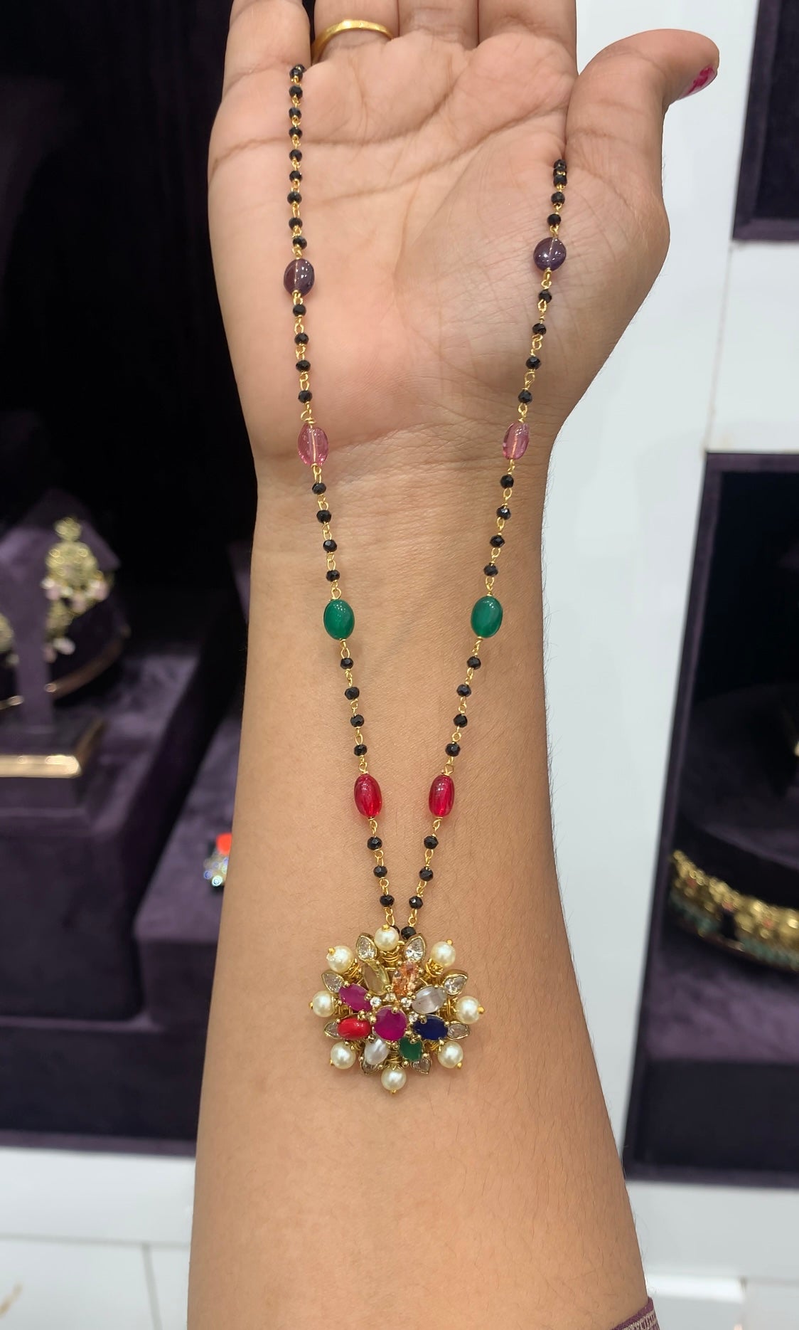 Beautiful Navarathna locket with Navarathna Black beads