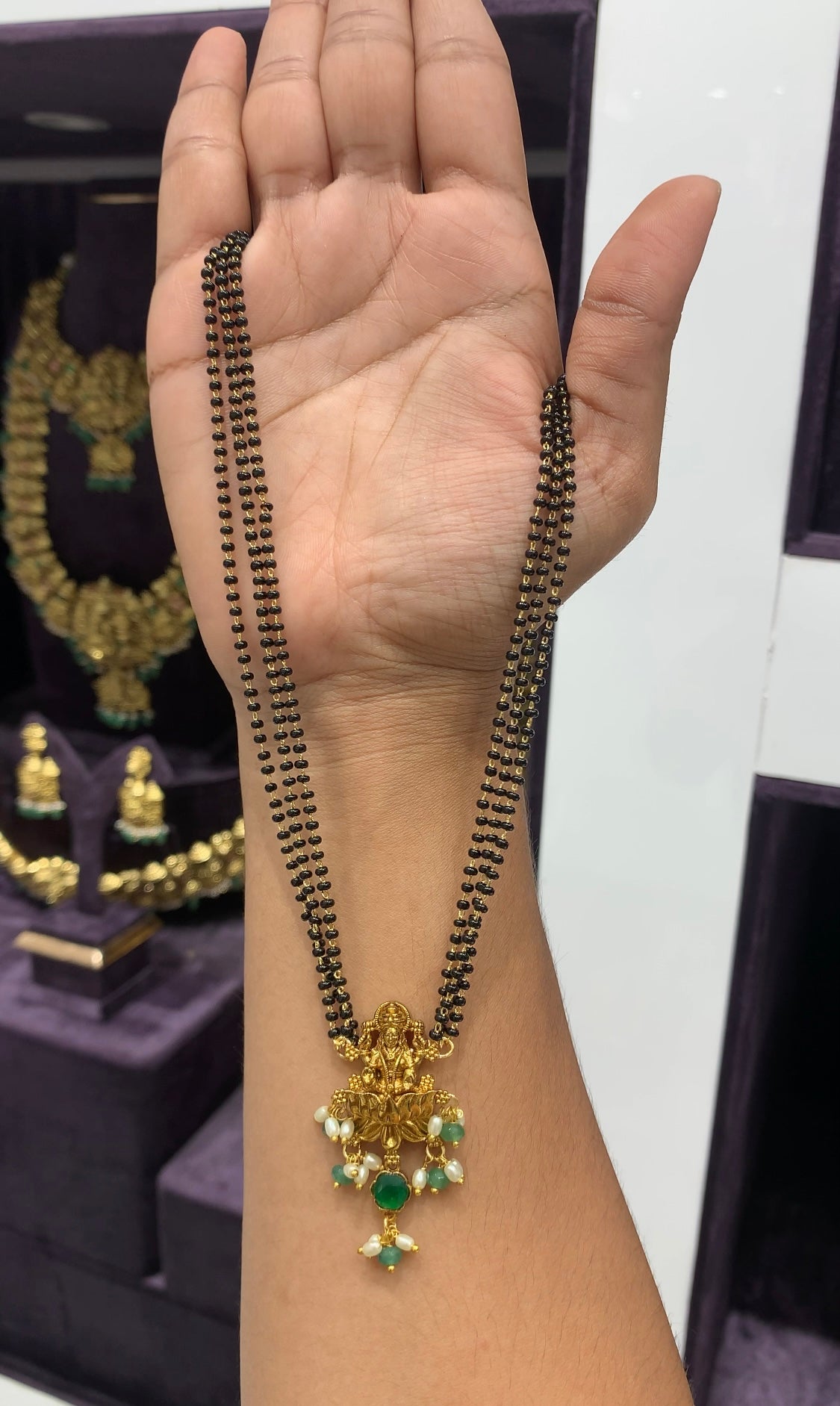Beautiful Lakshmi Nakshi Locket with 3 line black beads 16 inches