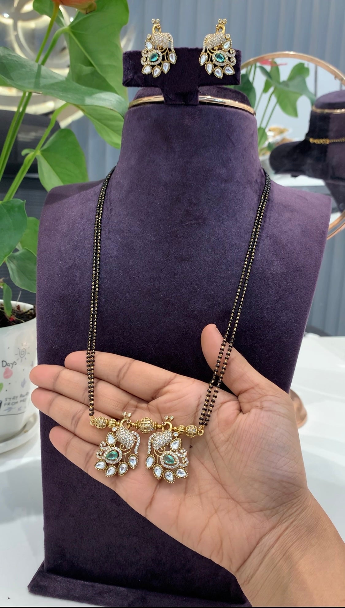 Beautiful Peacock Locket set with 24 inch long Black beads