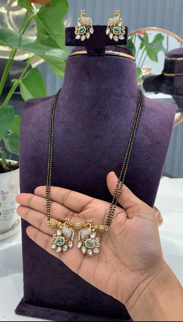 Beautiful Peacock Locket set with 24 inch long Black beads