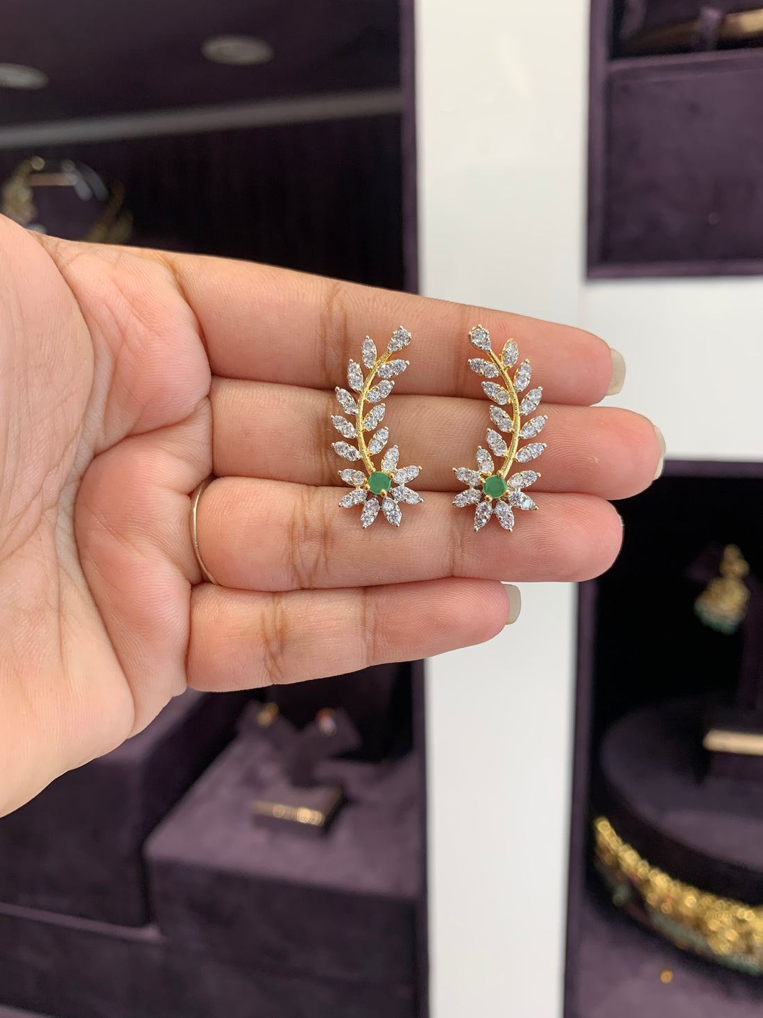 Beautiful nd stylish earcuffs model with green stone back stopper