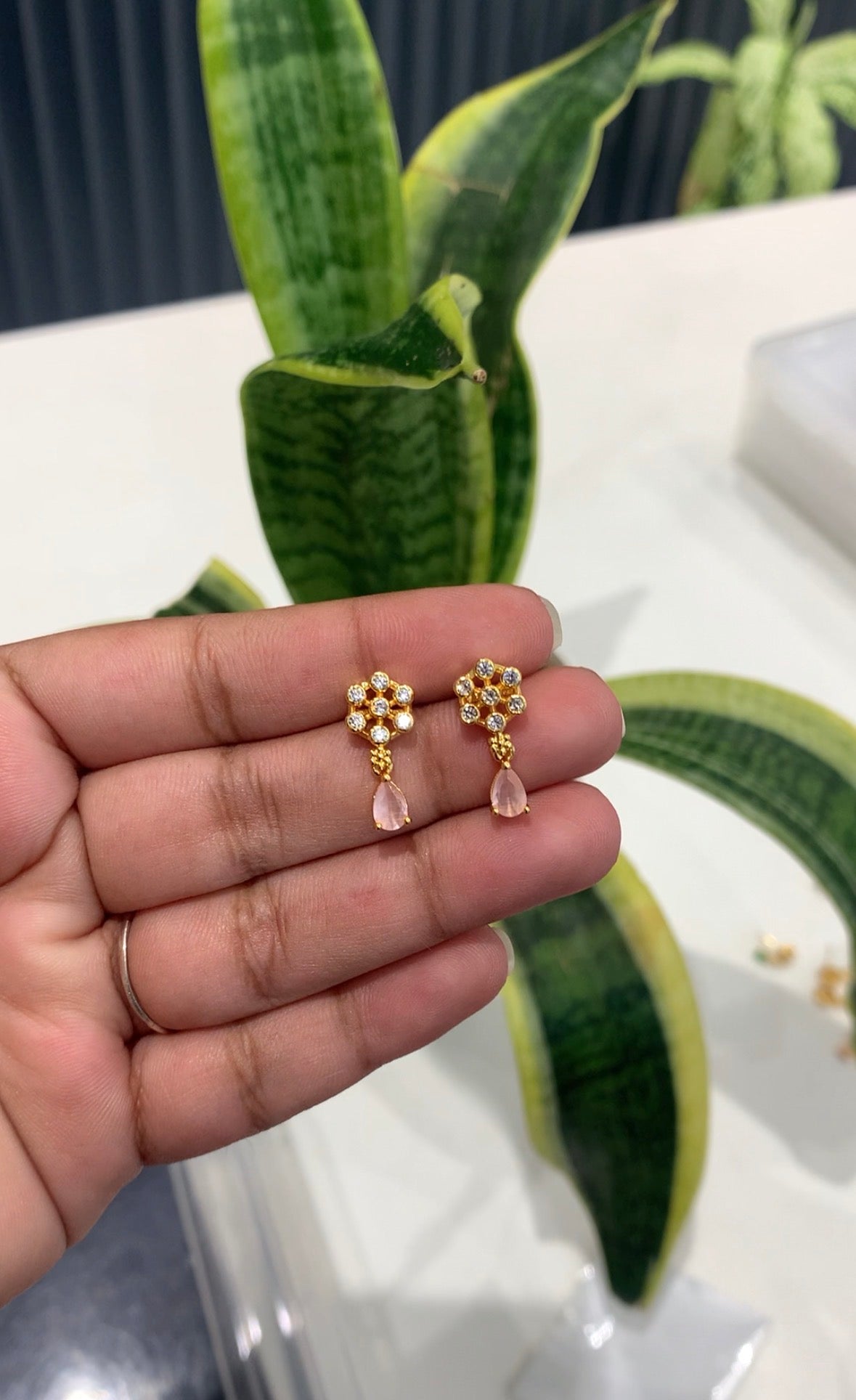 Beautiful cute lite pink studs with pushback