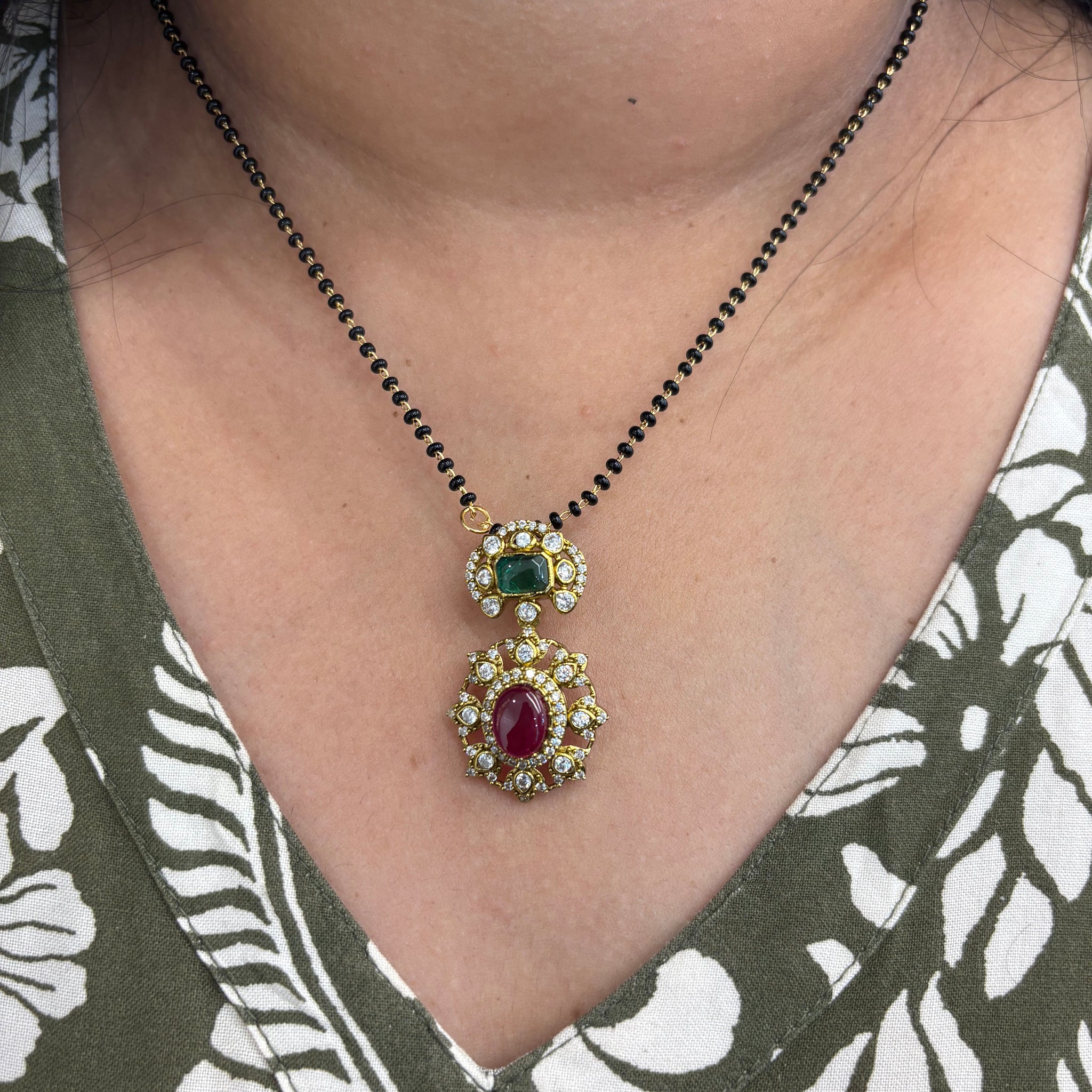 Multi locket with black beads