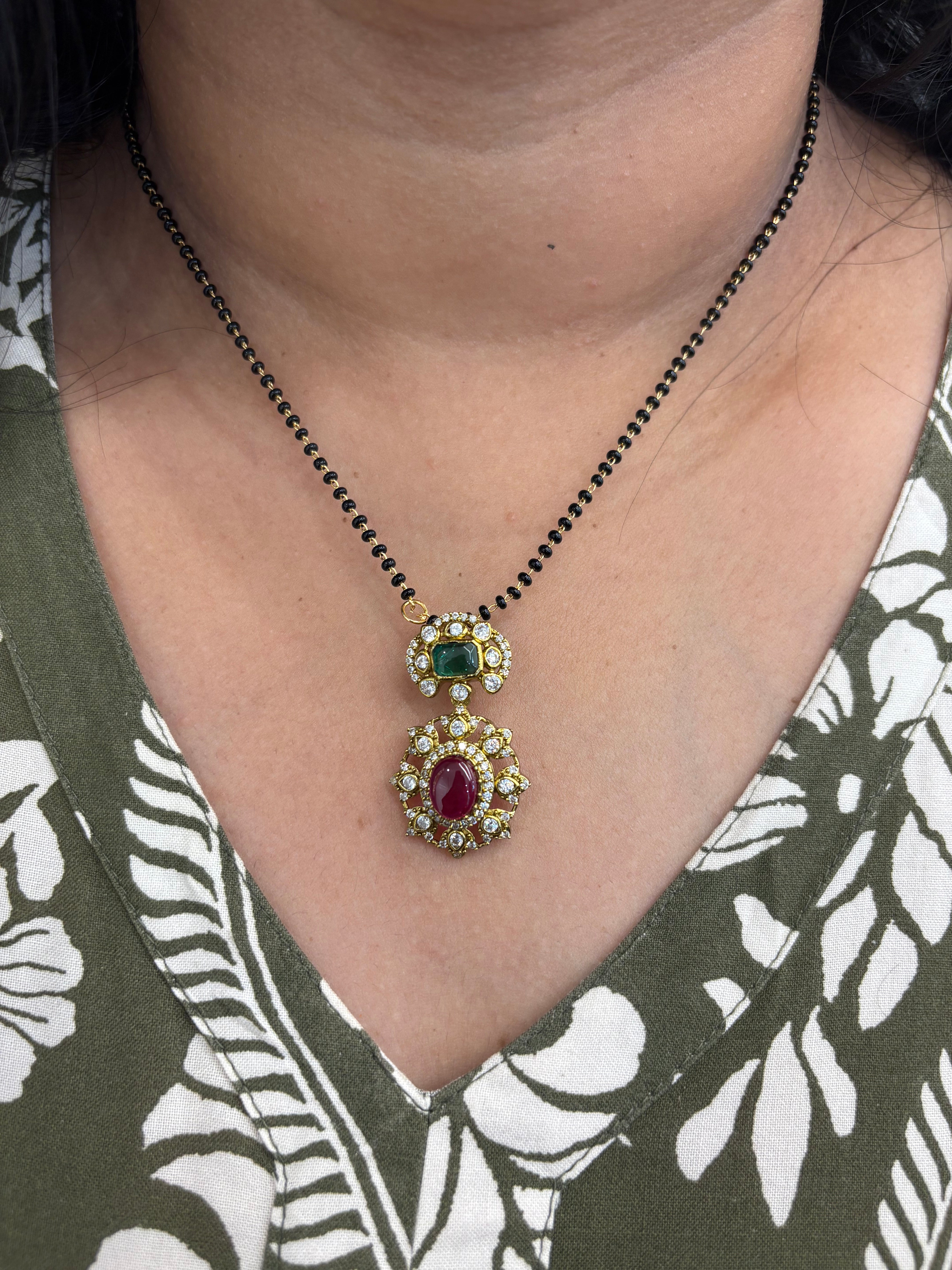 Multi locket with black beads