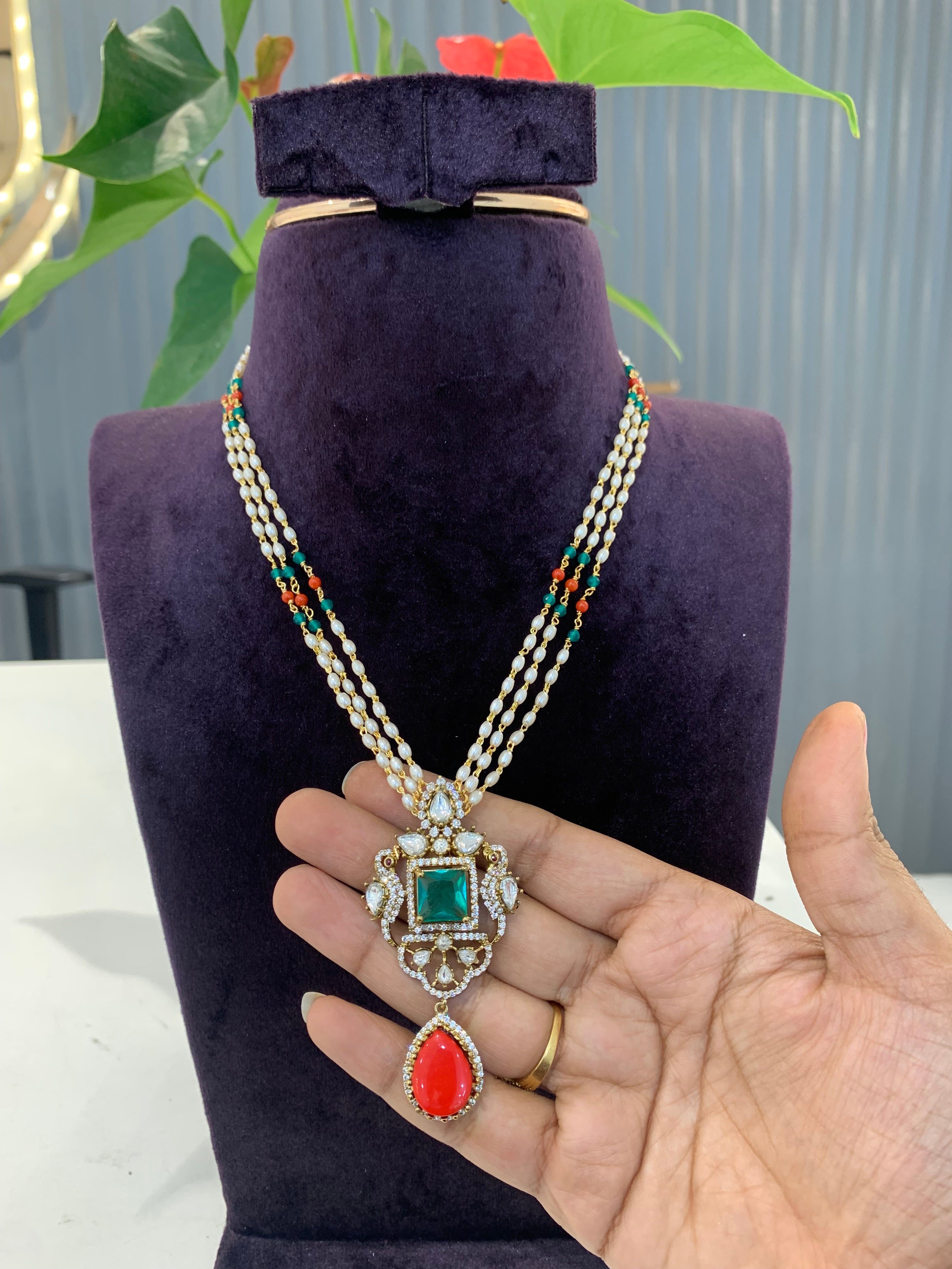 Beautiful locket with Pearl roll chain