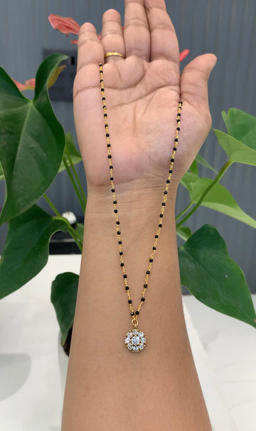Cute locket with Black beads
