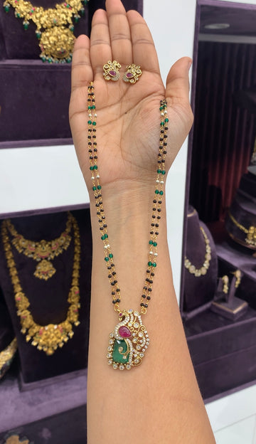 Beautiful Peacock locket set with black beads