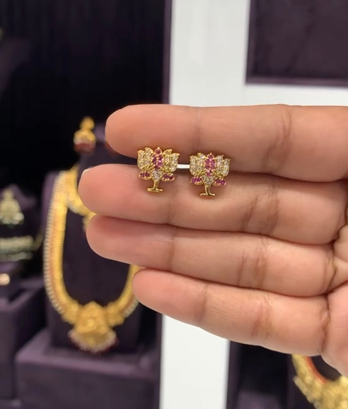 Beautiful ruby lotus studs with screwback