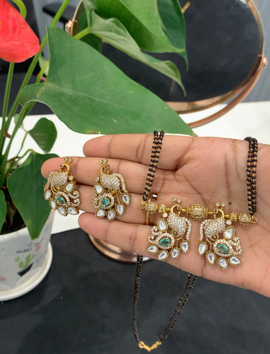 Beautiful Peacock Locket set with 24 inch long Black beads