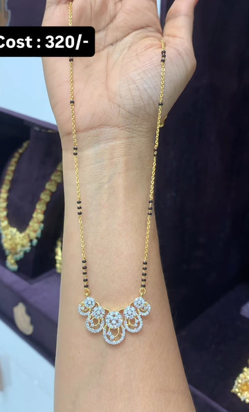 Beautiful black beads with GJ locket