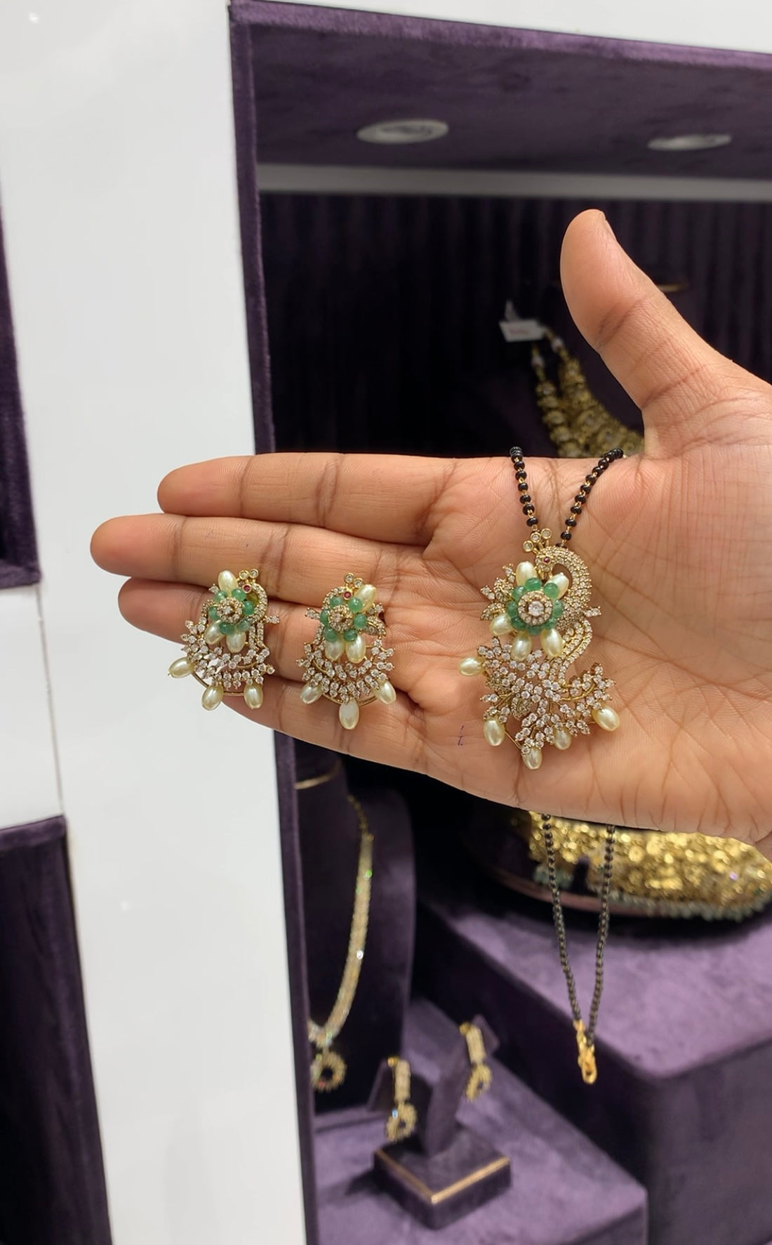 Peacock Pendent set with Black beads