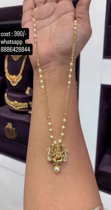 Beautiful traditional ganesh pendant with customised chandraharam set