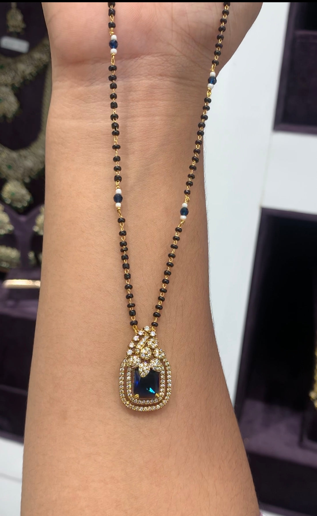 Beautiful locket set with black beads