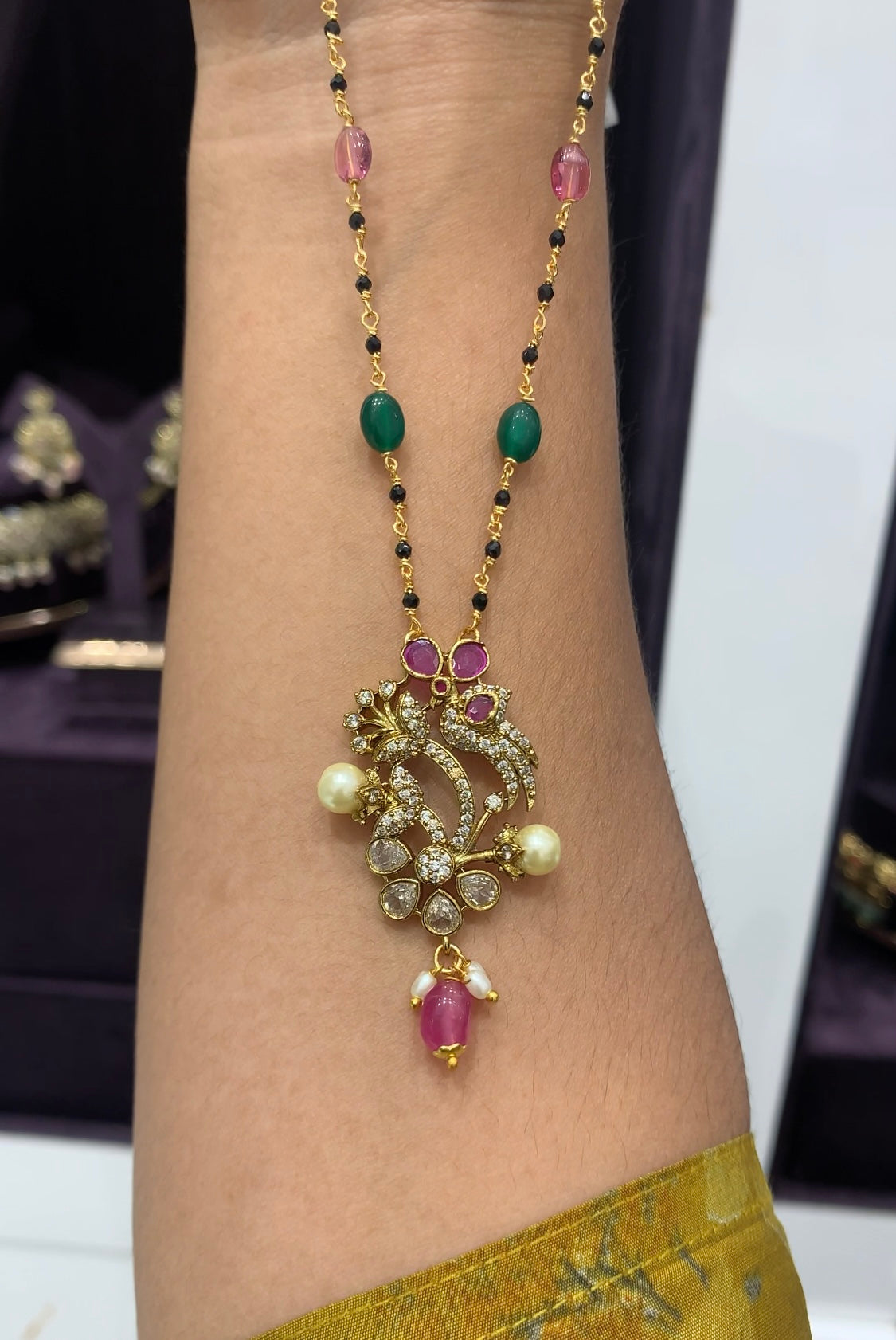 Beautiful locket with Navarathna Hand made Black beads