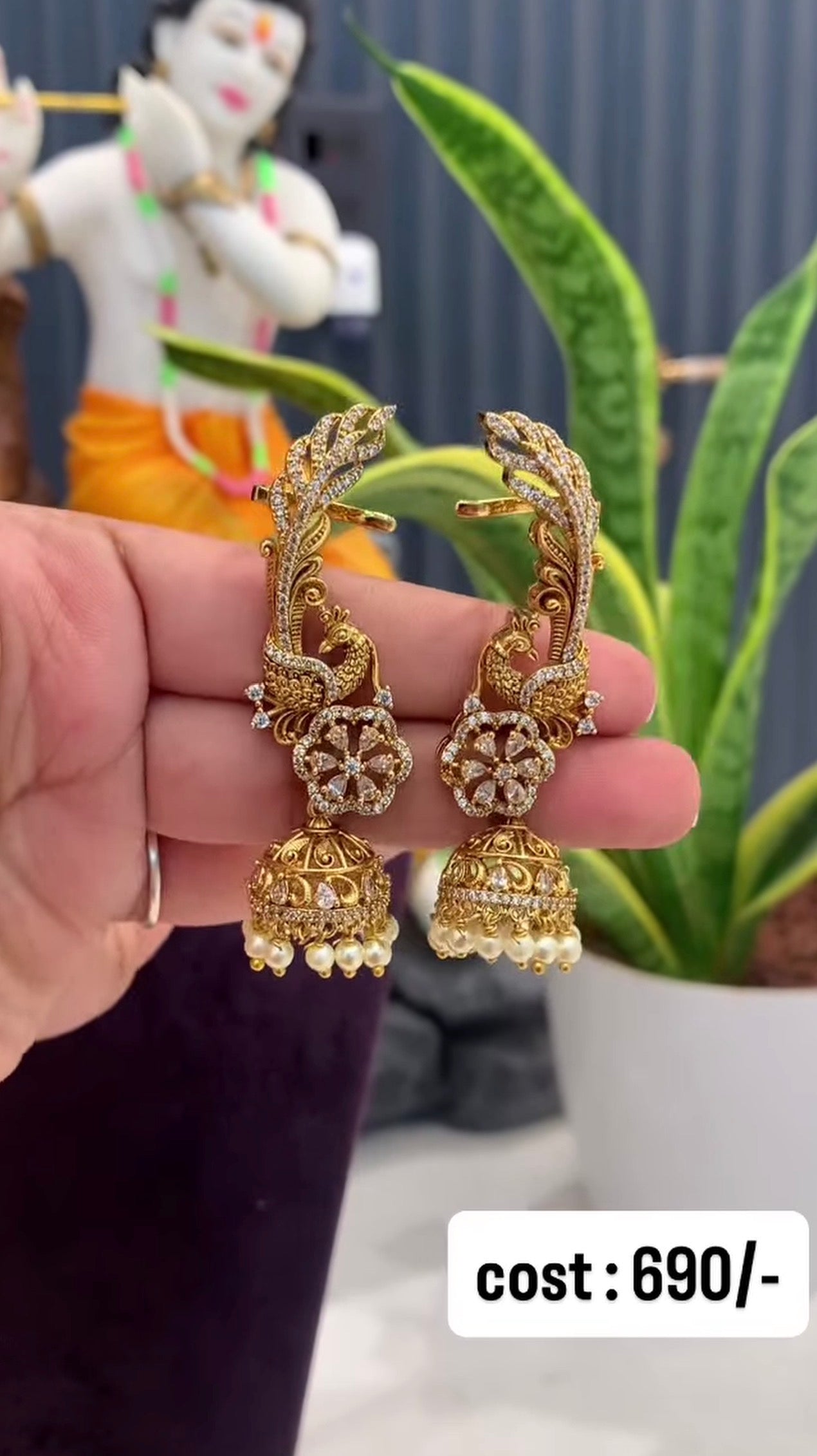 Beautiful peacock earcuffs