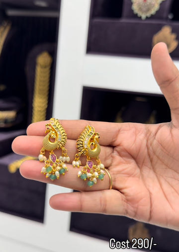 Beautiful peacock studs