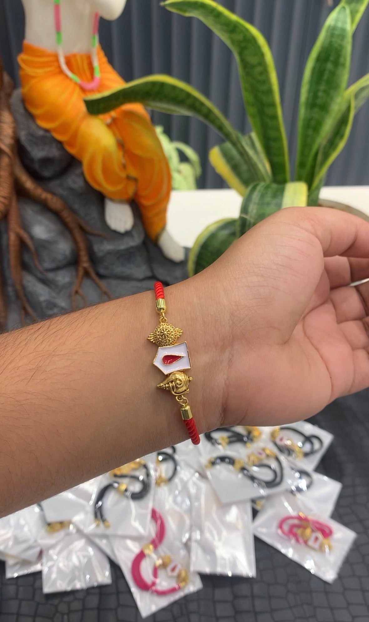 Beautiful Balaji bracelet with red thread