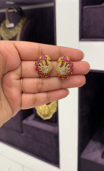 Beautiful peacock studs