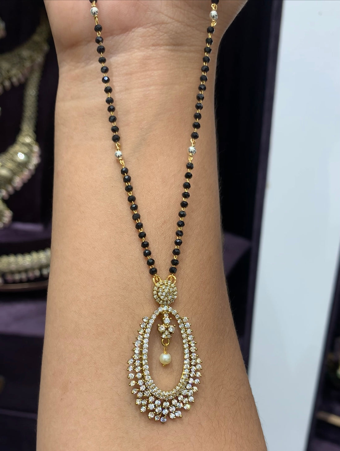 Beautiful locket set with Black beads