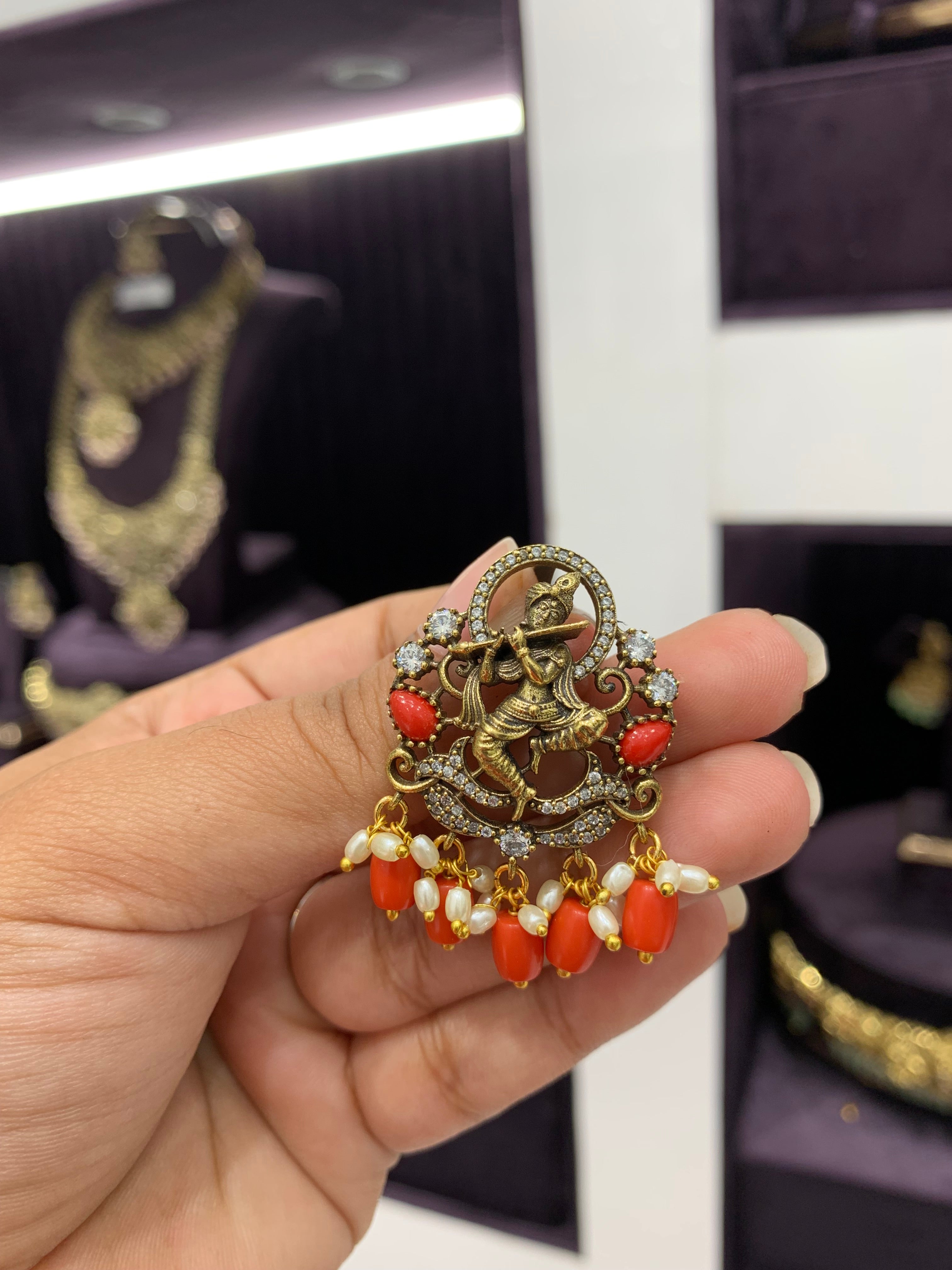 Beautiful lord krishna pendant with coral beads and back hook