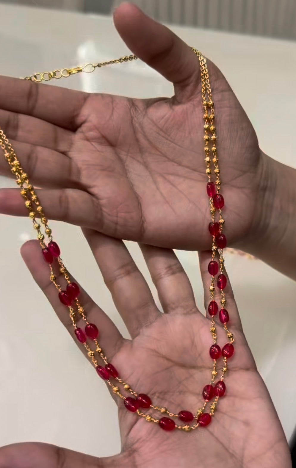 Beautiful 2 Line Red Beads malla customised with Gold Beads ( 18 inches )