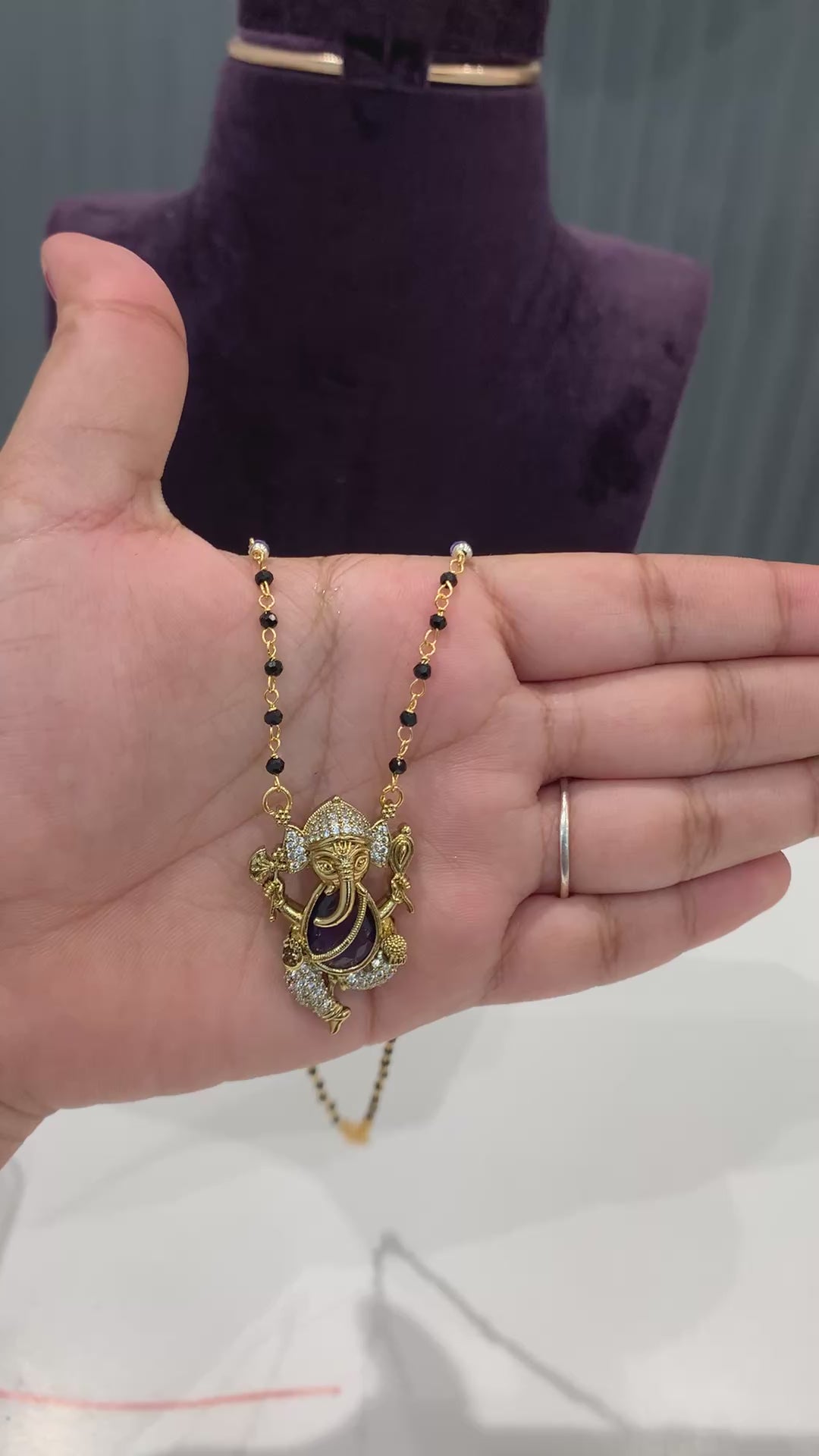 Beautiful Ganesh pendent black beads