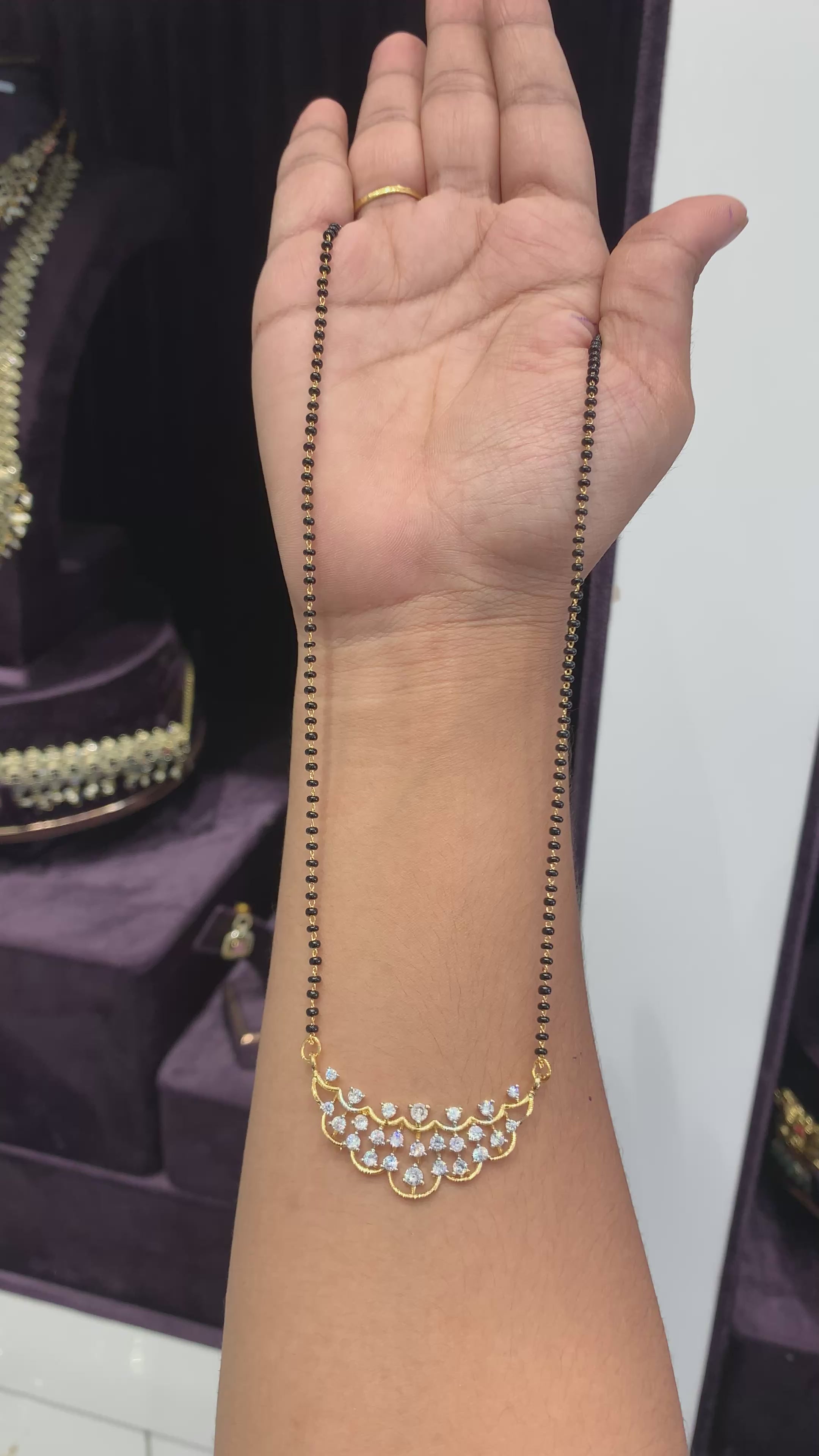 Beautiful black beads with GJ locket
