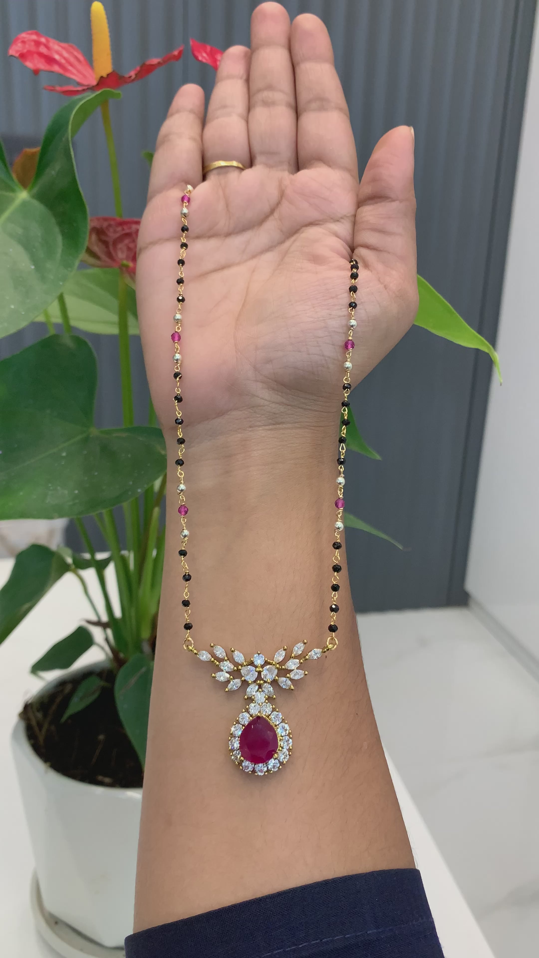 Beautiful pink stone locket with Black beads