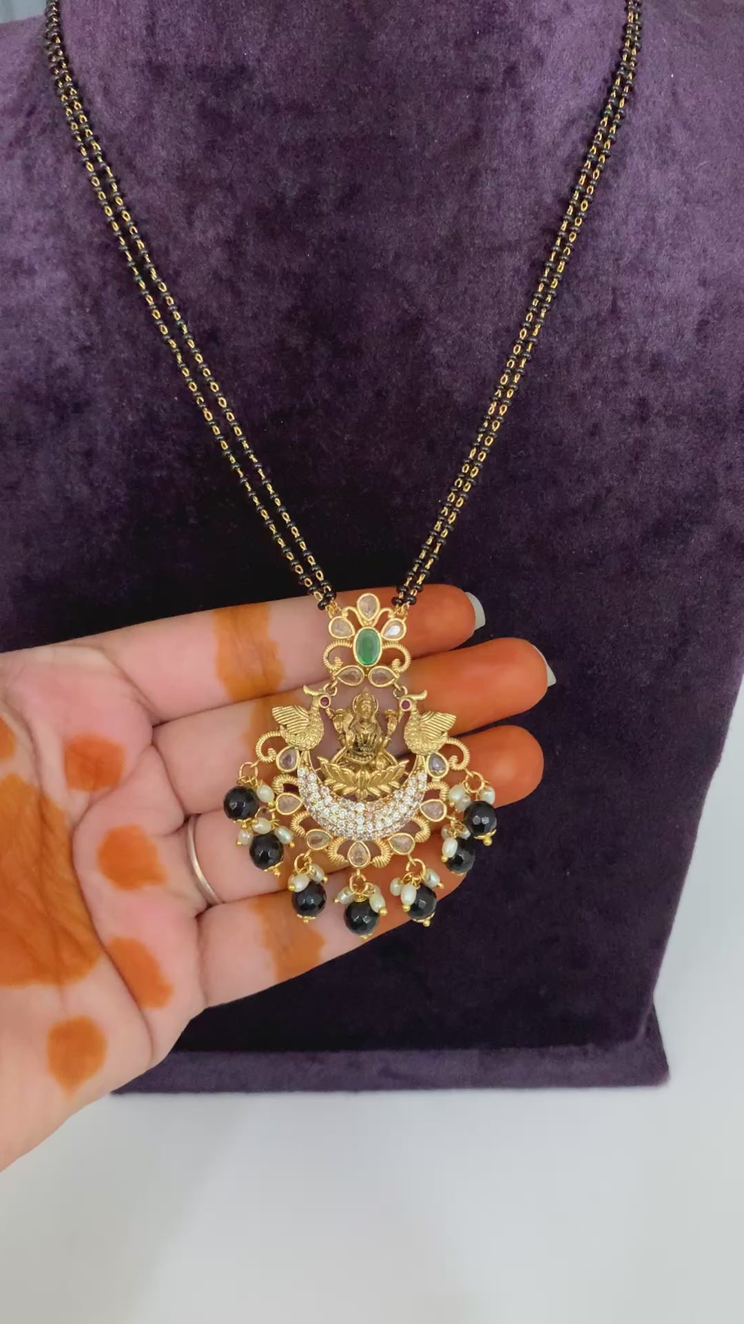 Beautiful black beads with Nakshi locket