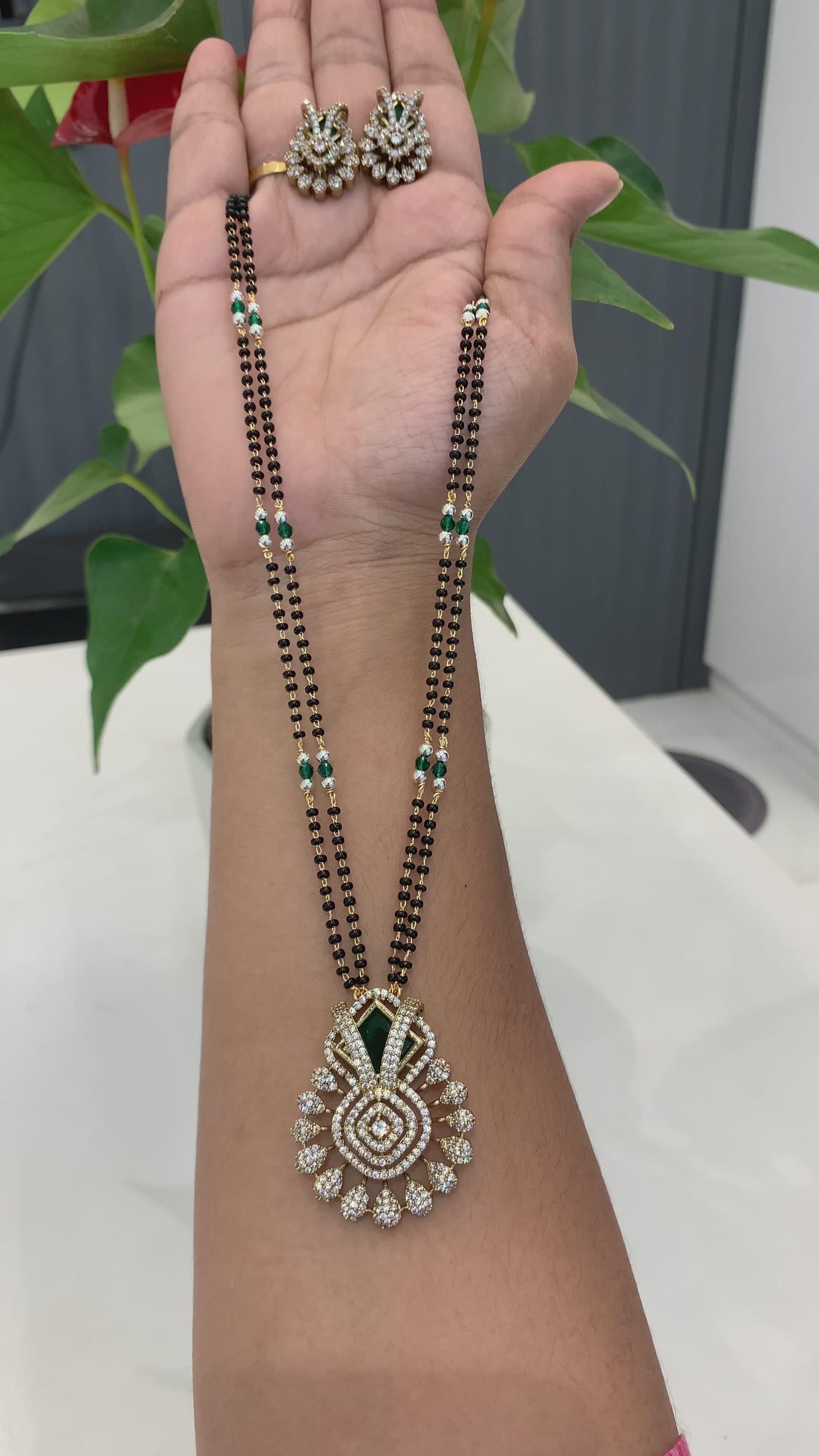 Beautiful Locket set with black beads
