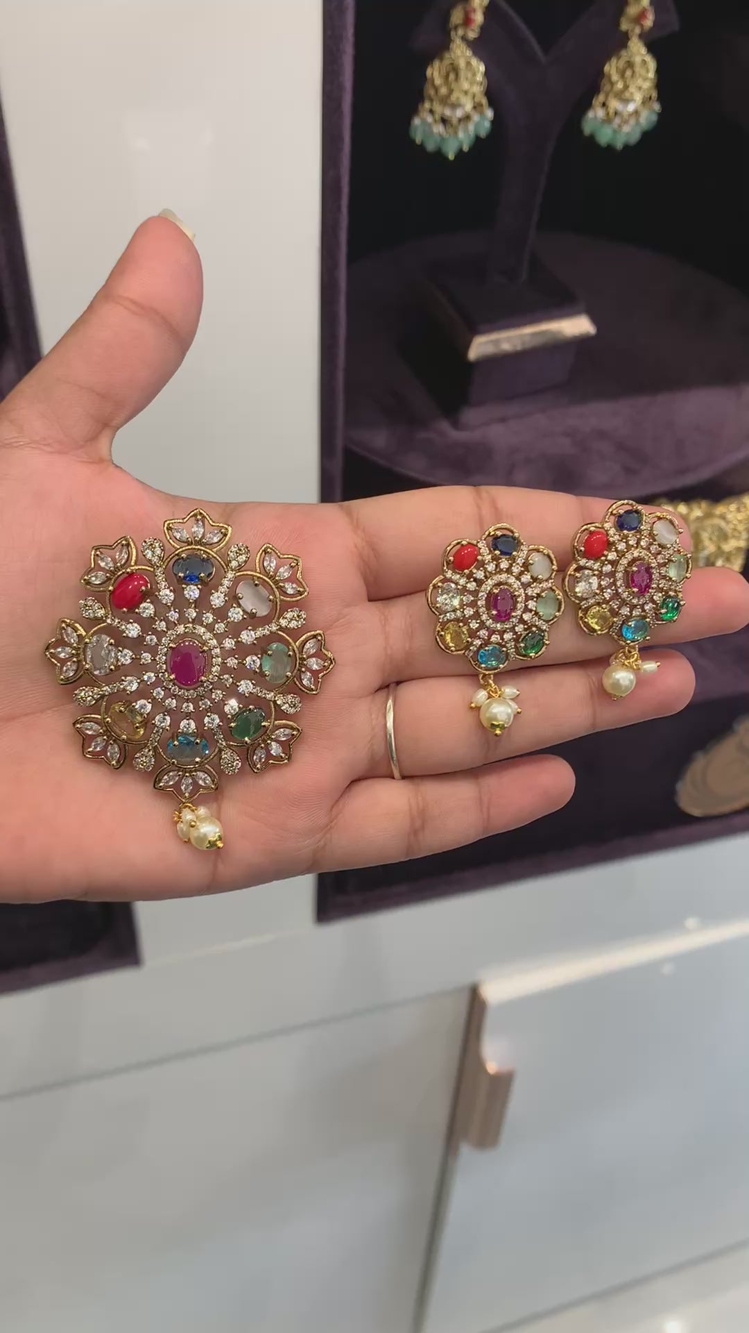 Beautiful navarathan pendent with back hook and earrings